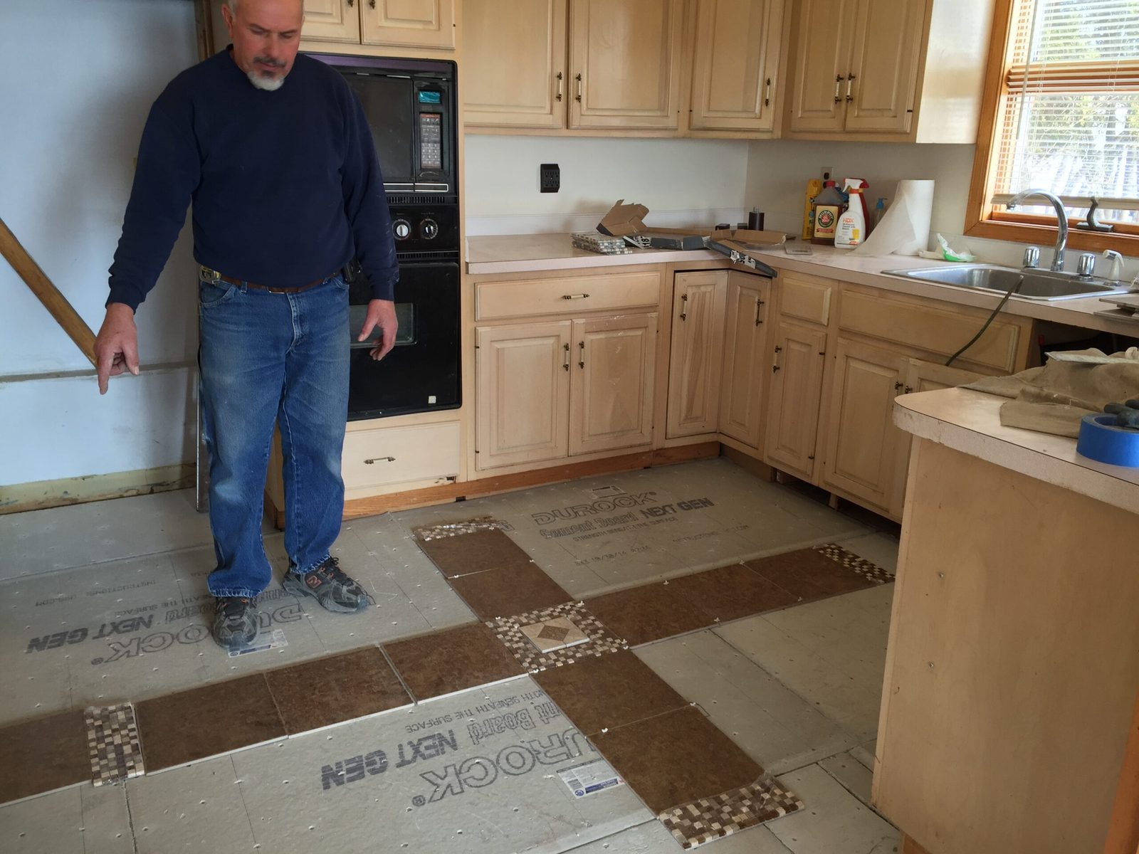 Laying out a kitchen floor before a single tile is set